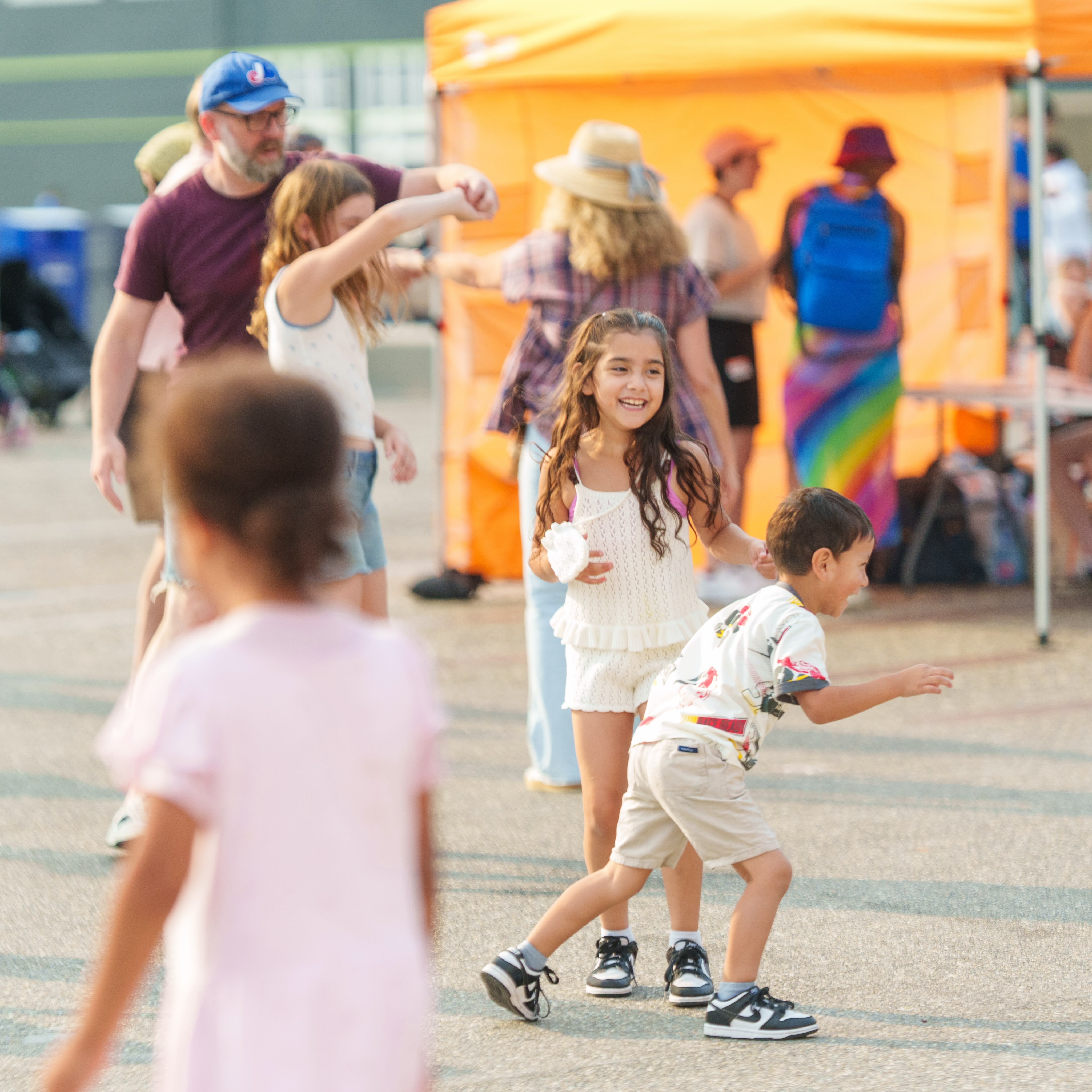 Kids dancing and playing at Hustle on the Pier